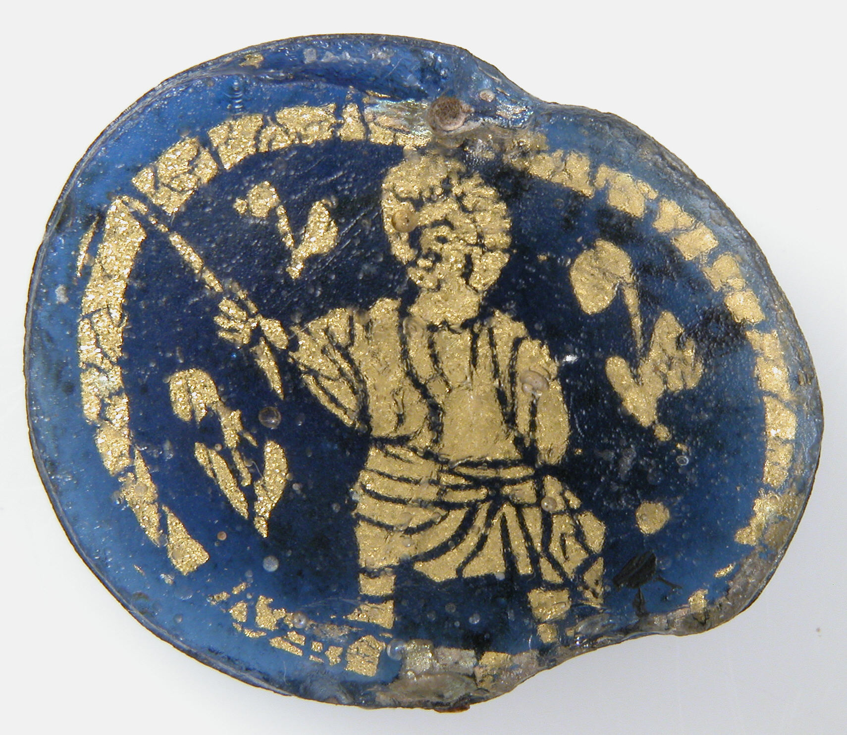 Small Roman or Byzantine gold-glass medallion from 300 to 500 showing Christ using a wand as a miracle worker