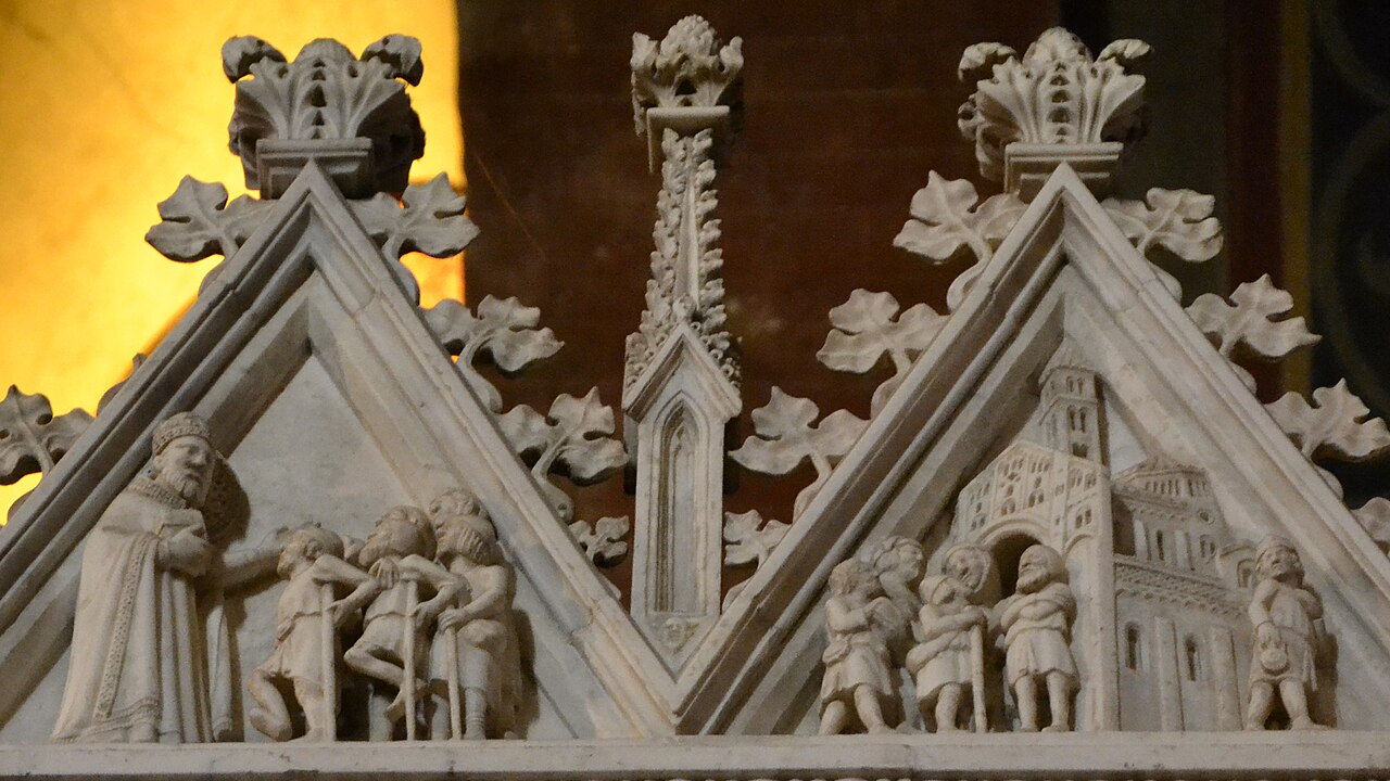 Carved reliefs on the medieval marble monument of Saint Augustine in Pavia