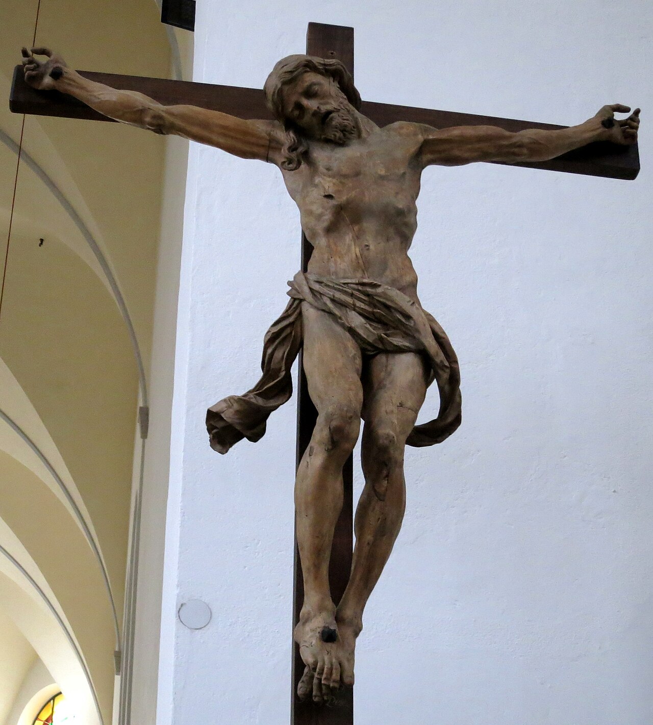 A wooden crucifix by the seventeenth-century sculptor Georg Petel in the Catholic Holy Cross Church, Augsburg