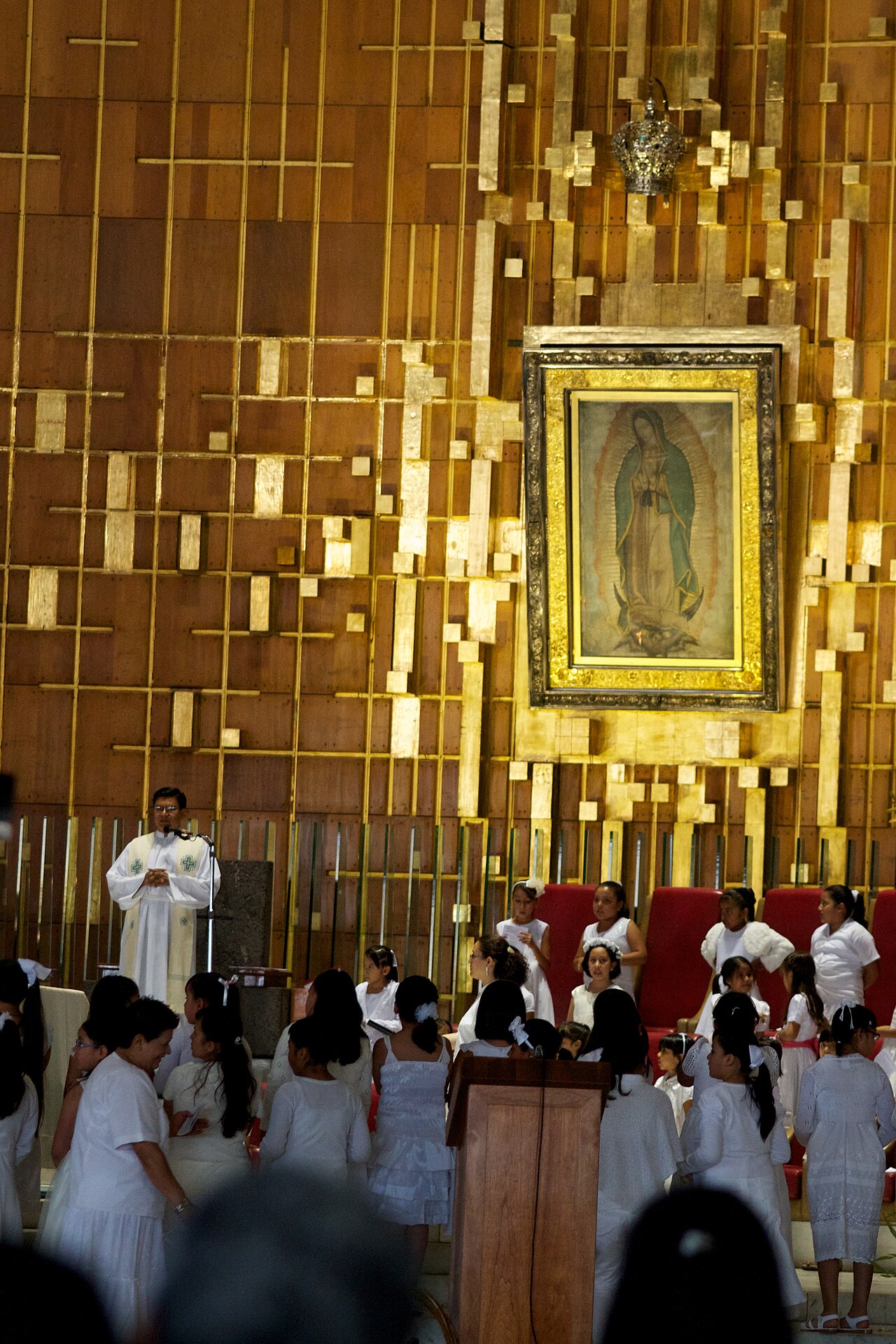 The interior of the new Basilica of Guadalupe, with the venerated image at its focal point