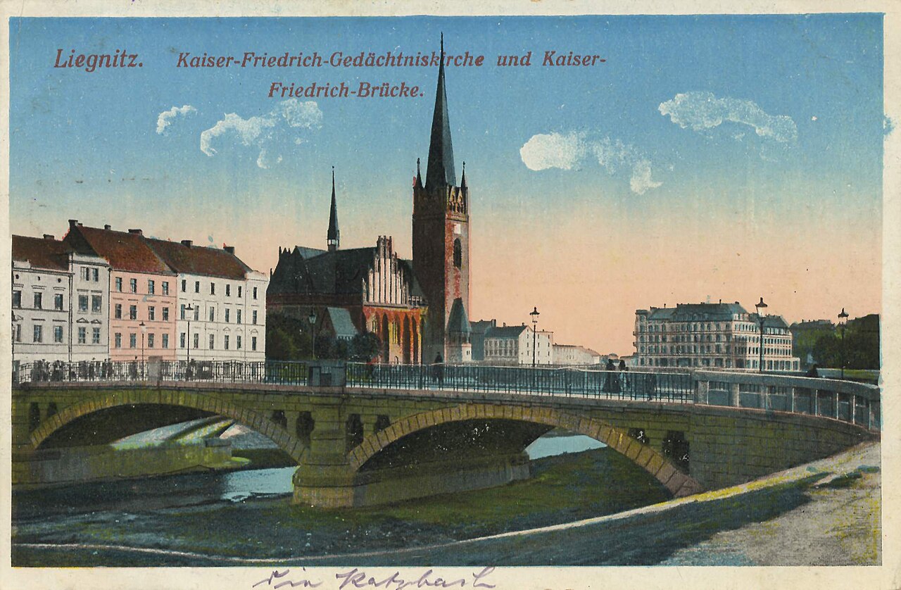 Historic postcard showing the building now known as Saint Hyacinth Church in Legnica and the nearby bridge
