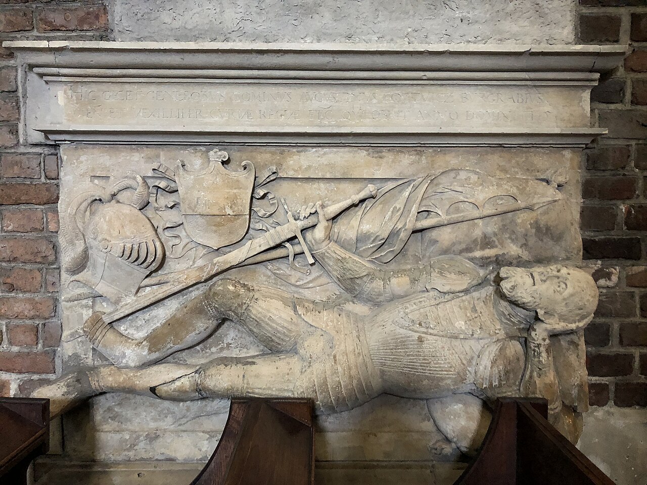 A historic sculpted tomb detail in Saint Anne’s Chapel in Corpus Christi Basilica, Kraków