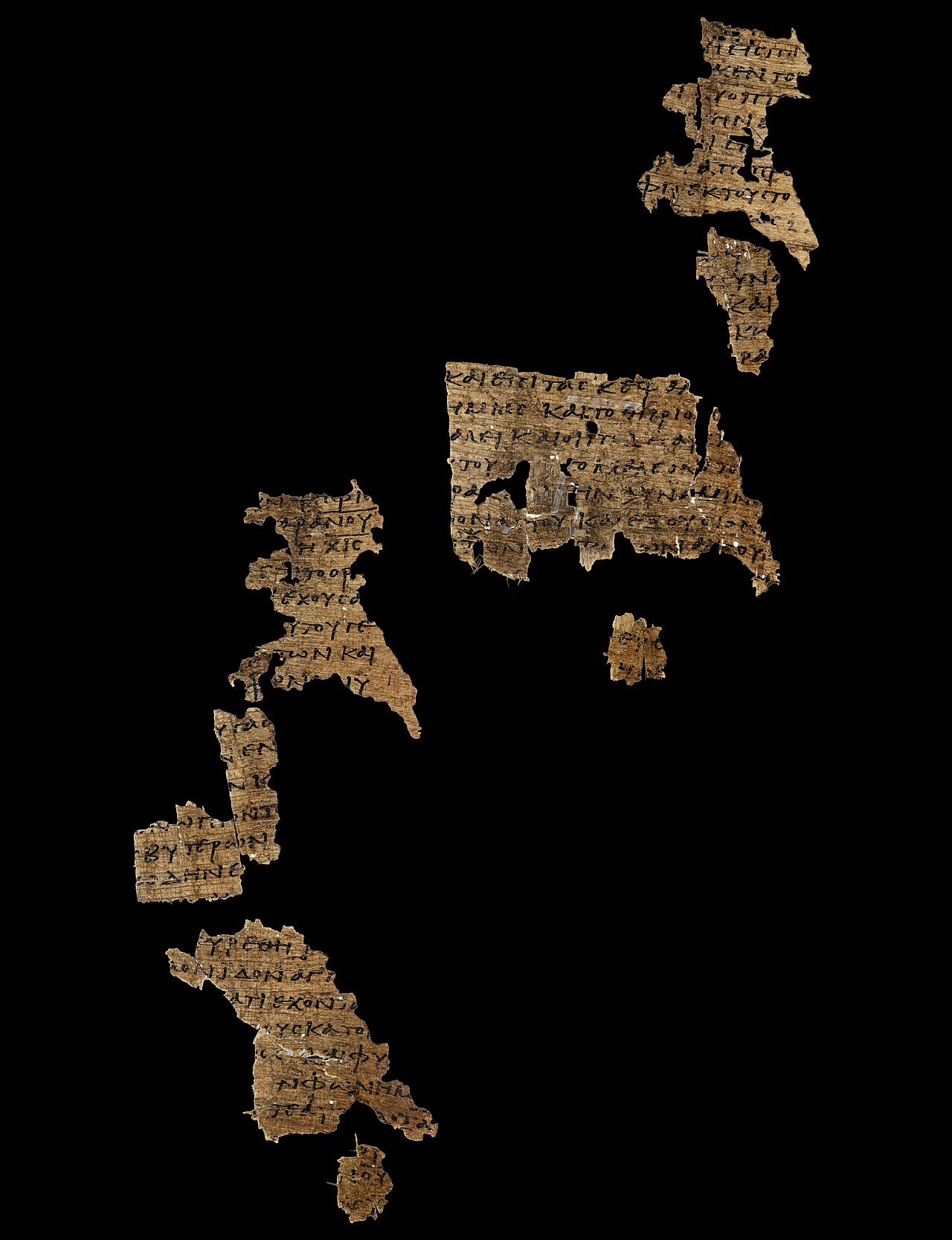 Several damaged Greek papyrus fragments arranged against a black background, from Papyrus 115.