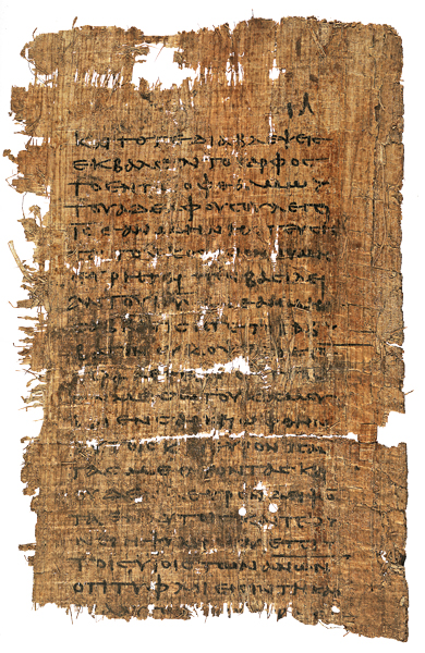 Damaged papyrus fragment with a single column of Greek writing and several holes, shown on a white background.