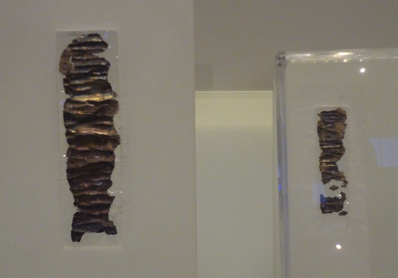 The small silver scrolls from Ketef Hinnom displayed at the Israel Museum.